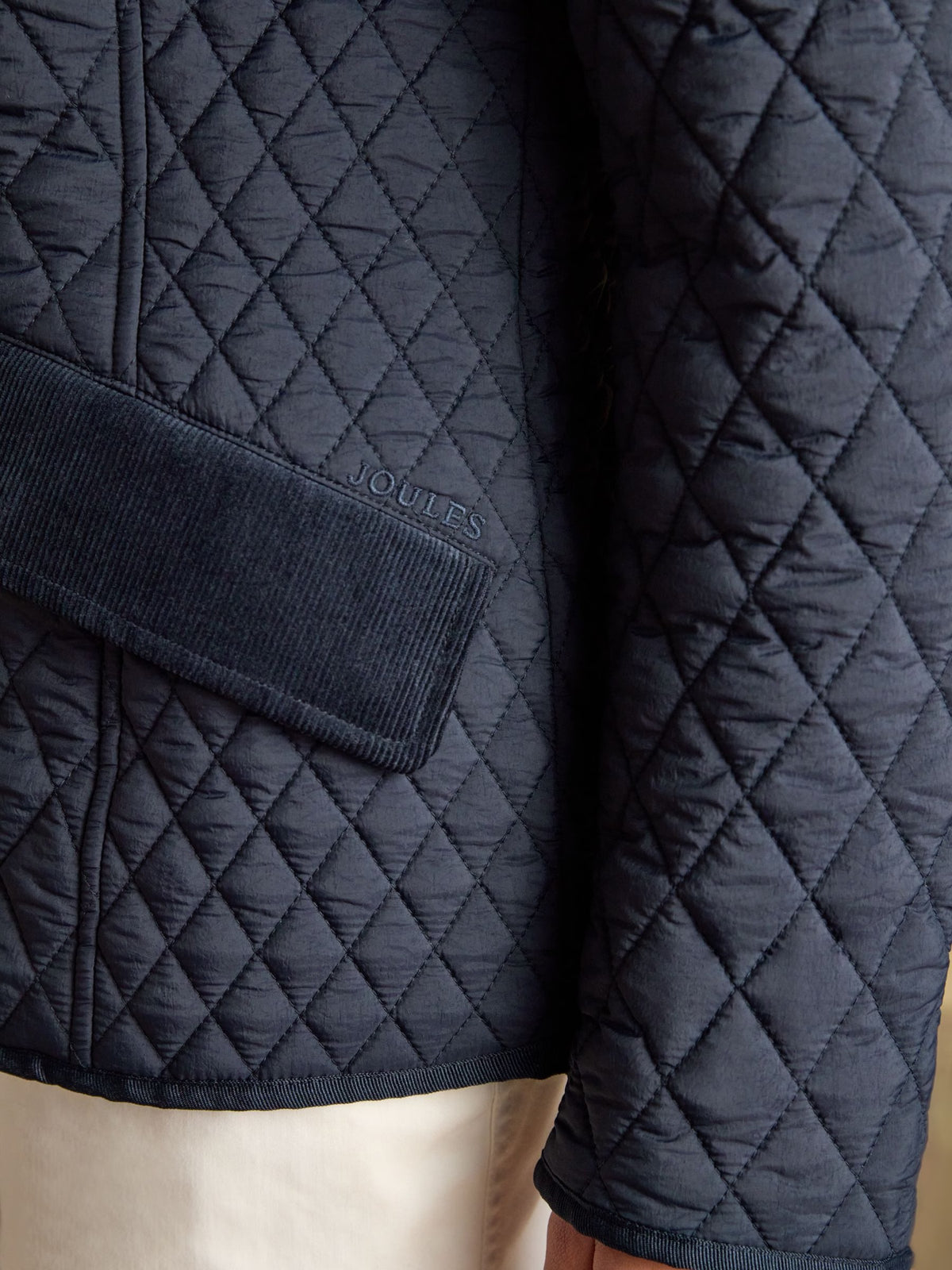 Highclere Navy Showerproof Diamond Quilted Jacket.